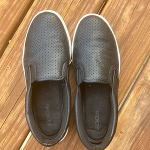 Soda women’s black slip-ons, size 9.